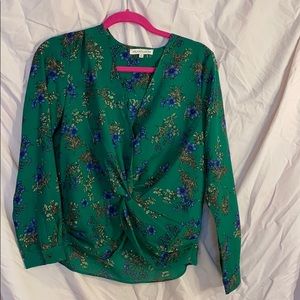 Green blouse with purple flowers